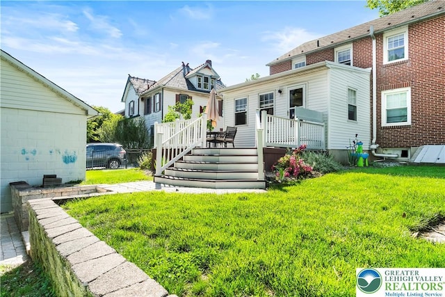 631 Main St, Tatamy Borough, PA 18085 - back of house with a deck and a yard