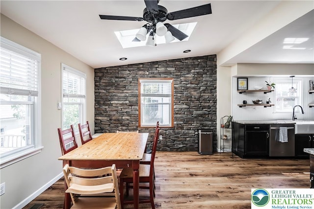 631 Main St, Tatamy Borough, PA 18085 - dining room featuring a skylight, a ceiling fan, wood finished floors, lofted ceiling, and healthy amount of natural light