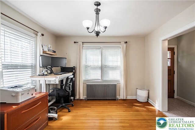 631 Main St, Tatamy Borough, PA 18085 - office with radiator, light wood-style flooring, a chandelier, and baseboards