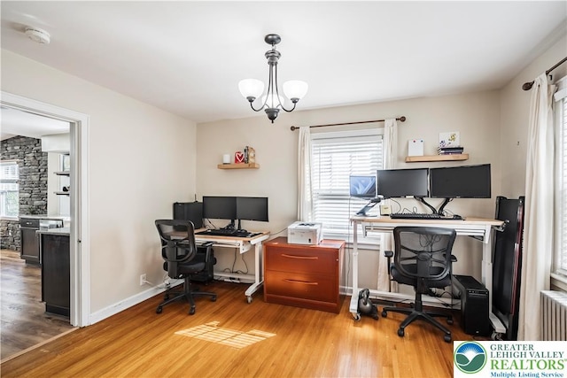 631 Main St, Tatamy Borough, PA 18085 - office featuring wood finished floors, healthy amount of natural light, and radiator heating unit