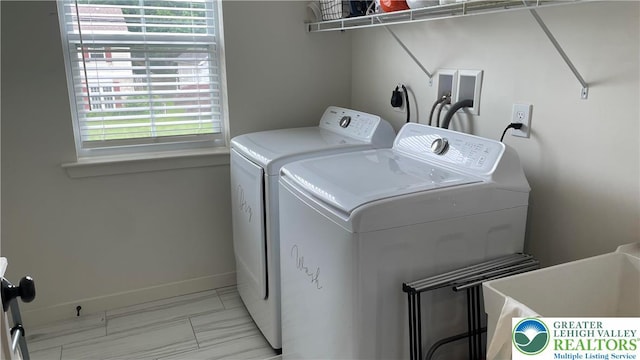 331 Minor St, Emmaus Borough, PA 18049 - laundry room with independent washer and dryer, plenty of natural light, and baseboards