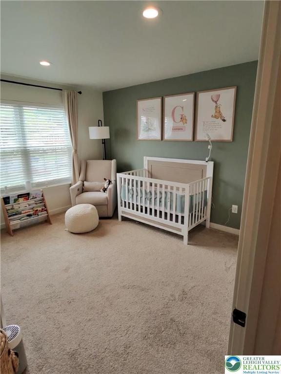 331 Minor St, Emmaus Borough, PA 18049 - carpeted bedroom with a nursery area, baseboards, and recessed lighting