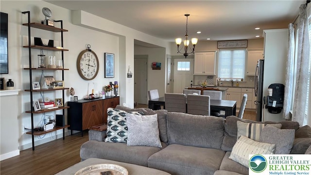 331 Minor St, Emmaus Borough, PA 18049 - living room with a chandelier, dark wood-style floors, and recessed lighting