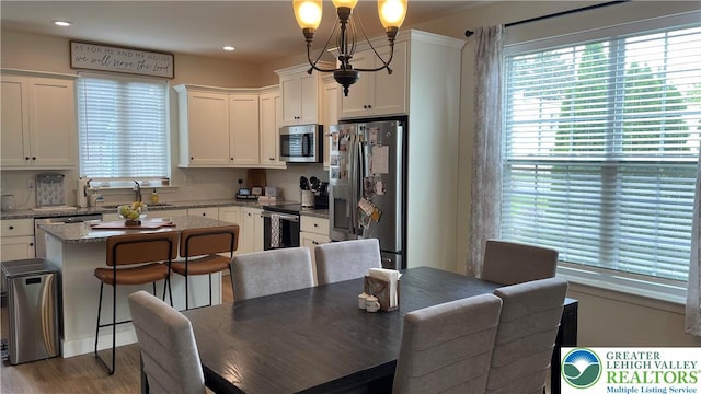 331 Minor St, Emmaus Borough, PA 18049 - dining space featuring healthy amount of natural light, wood finished floors, and recessed lighting
