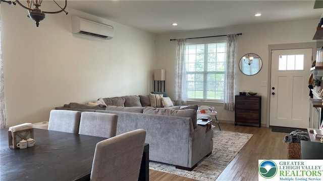 331 Minor St, Emmaus Borough, PA 18049 - living room with a wall mounted air conditioner, wood finished floors, and recessed lighting