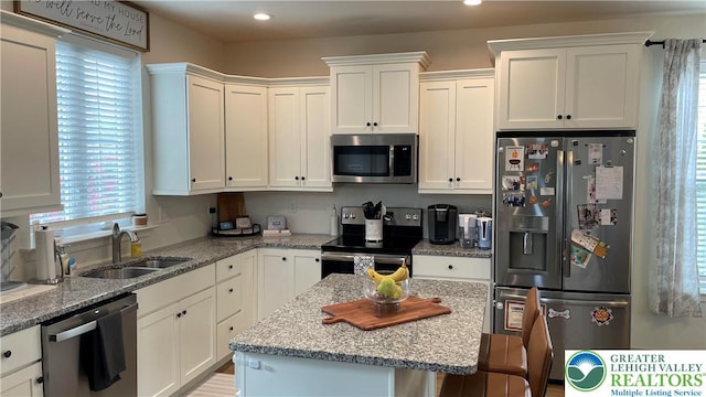 331 Minor St, Emmaus Borough, PA 18049 - kitchen featuring stainless steel appliances, a sink, plenty of natural light, white cabinetry, and recessed lighting