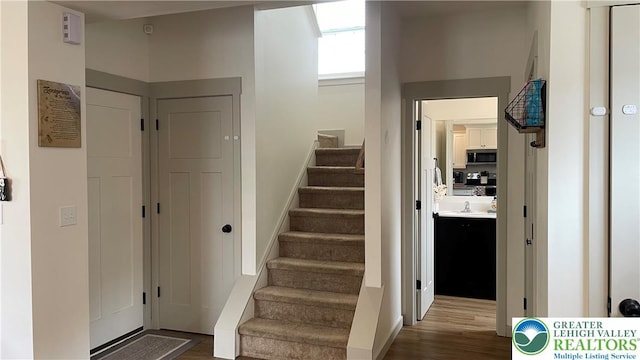 331 Minor St, Emmaus Borough, PA 18049 - staircase featuring wood finished floors and baseboards