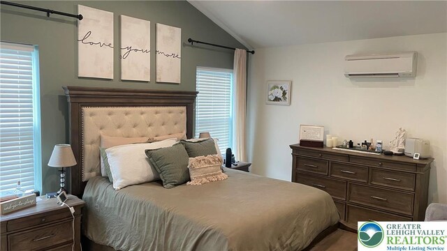 331 Minor St, Emmaus Borough, PA 18049 - bedroom with a wall unit AC and vaulted ceiling