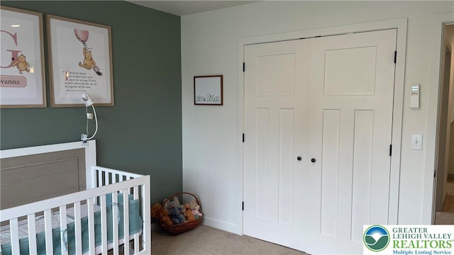 331 Minor St, Emmaus Borough, PA 18049 - bedroom with carpet flooring, a nursery area, a closet, and baseboards