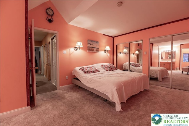 2107 3rd St, Bethlehem Twp, PA 18020 - carpeted bedroom with two closets, baseboards, and lofted ceiling