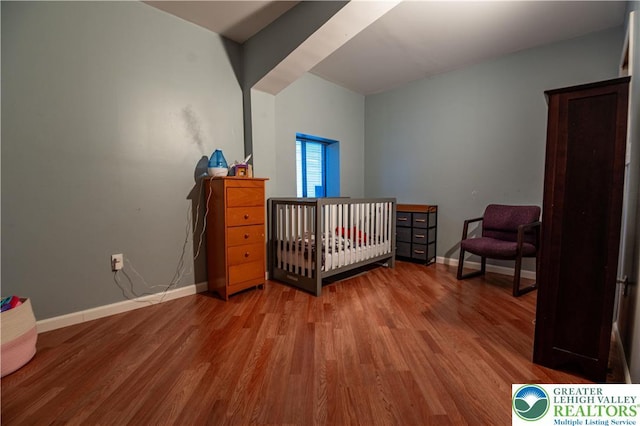 2107 3rd St, Bethlehem Twp, PA 18020 - bedroom featuring wood finished floors and baseboards