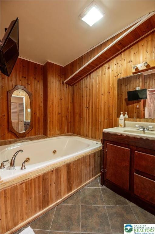 2107 3rd St, Bethlehem Twp, PA 18020 - full bath with a tub with jets, vanity, wooden walls, and tile patterned flooring