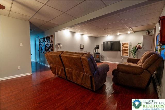 2107 3rd St, Bethlehem Twp, PA 18020 - living room with a paneled ceiling, wood finished floors, and baseboards