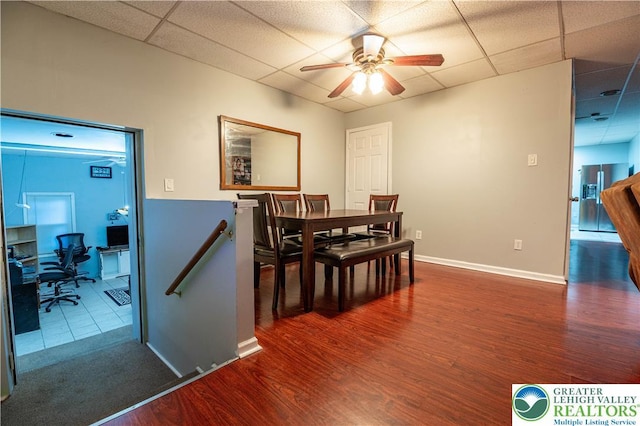 2107 3rd St, Bethlehem Twp, PA 18020 - dining area featuring a paneled ceiling, wood finished floors, a ceiling fan, a desk, and baseboards