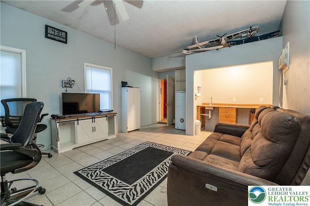 2107 3rd St, Bethlehem Twp, PA 18020 - living area featuring light tile patterned flooring, ceiling fan, and a desk