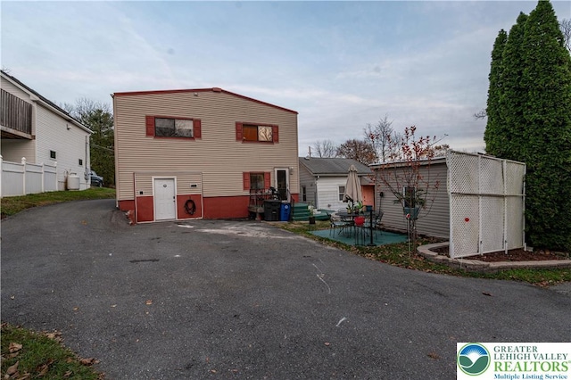 2107 3rd St, Bethlehem Twp, PA 18020 - back of property featuring central AC unit and a patio area