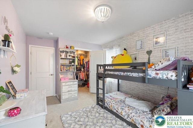 2585 Raya Way, Bethlehem Twp, PA 18045 - bedroom with a walk in closet, carpet, a closet, and brick wall