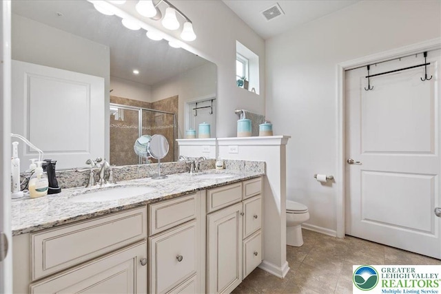 2585 Raya Way, Bethlehem Twp, PA 18045 - full bath with toilet, a stall shower, double vanity, and baseboards