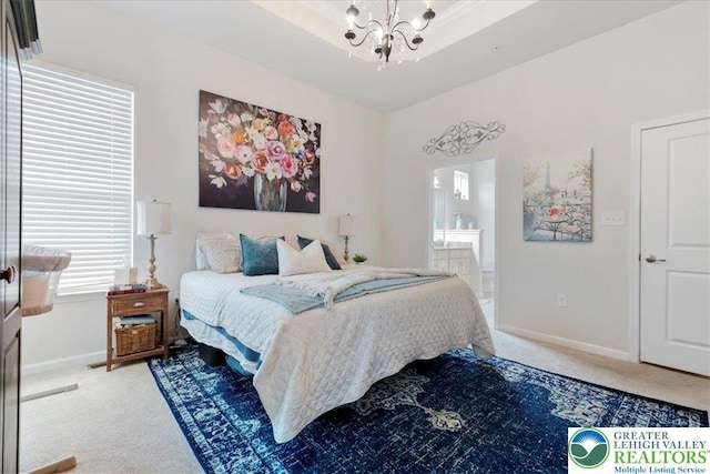 2585 Raya Way, Bethlehem Twp, PA 18045 - carpeted bedroom with a chandelier, baseboards, and ensuite bath