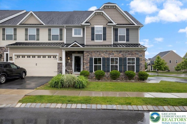2585 Raya Way, Bethlehem Twp, PA 18045 - view of front of property with a standing seam roof, stone siding, metal roof, and asphalt driveway