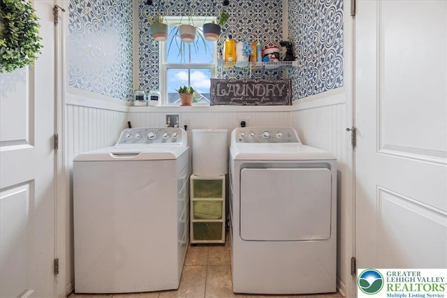 2585 Raya Way, Bethlehem Twp, PA 18045 - washroom with washing machine and dryer, wainscoting, wallpapered walls, a decorative wall, and tile patterned flooring