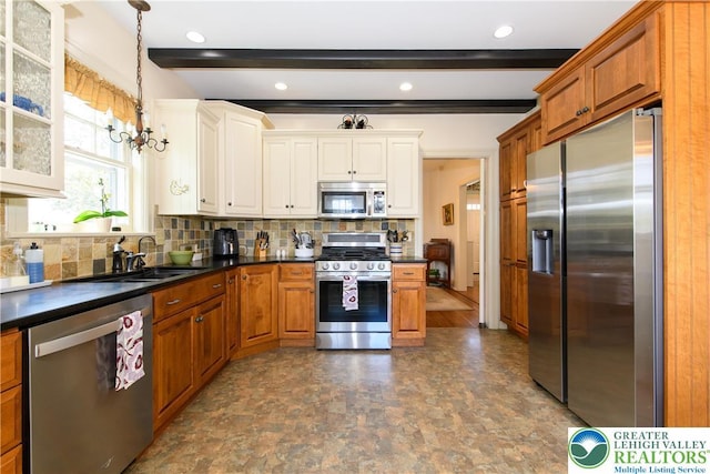 215 S 22nd St, Allentown City, PA 18104 - kitchen featuring appliances with stainless steel finishes, beam ceiling, decorative backsplash, and dark countertops