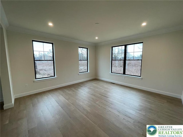 Blue Barn Rd Unit 1456, Upper Macungie Twp, PA 18104 - unfurnished room with ornamental molding, wood finished floors, baseboards, and recessed lighting
