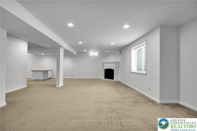 8604 Cascade Rd, Upper Macungie Twp, PA 18031 - basement with a fireplace with raised hearth, carpet flooring, recessed lighting, and baseboards