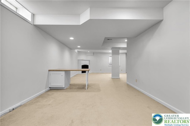 8604 Cascade Rd, Upper Macungie Twp, PA 18031 - basement featuring light colored carpet, recessed lighting, a fireplace, and baseboards