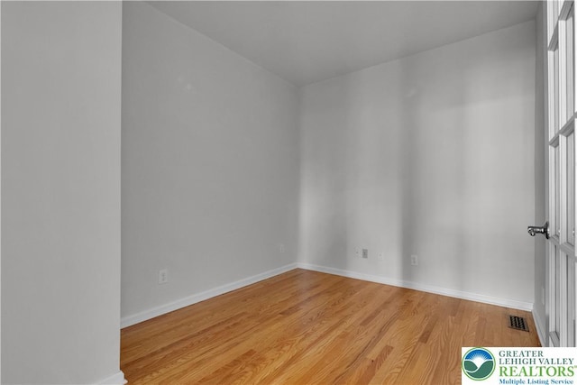 8604 Cascade Rd, Upper Macungie Twp, PA 18031 - spare room featuring wood finished floors and baseboards