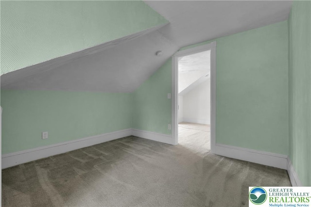 622 Scholl Ave, Salisbury Twp, PA 18015 - bonus room featuring vaulted ceiling, carpet floors, and baseboards