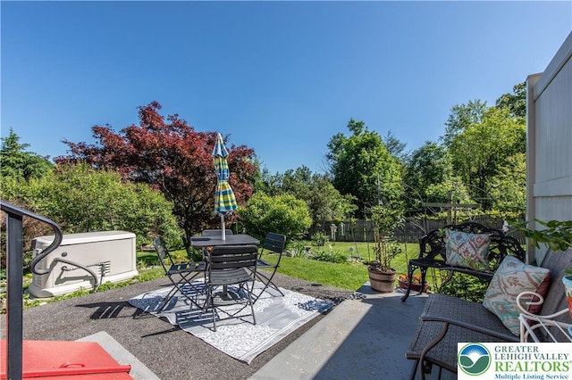 622 Scholl Ave, Salisbury Twp, PA 18015 - view of patio featuring outdoor dining area and view of scattered trees