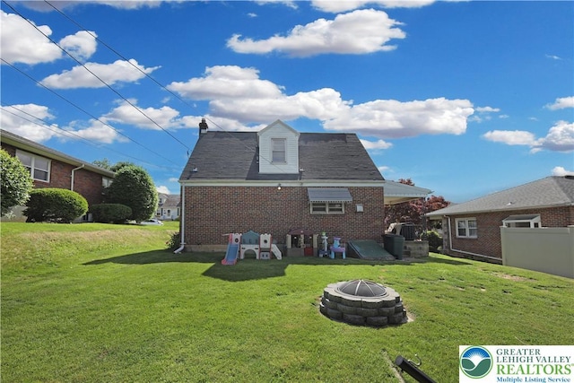 613 S Hoffert St, Fountain Hill Boro, PA 18015 - back of house with brick siding and a fire pit