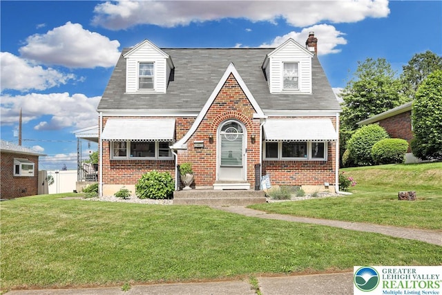 613 S Hoffert St, Fountain Hill Boro, PA 18015 - view of front of property with brick siding and a chimney