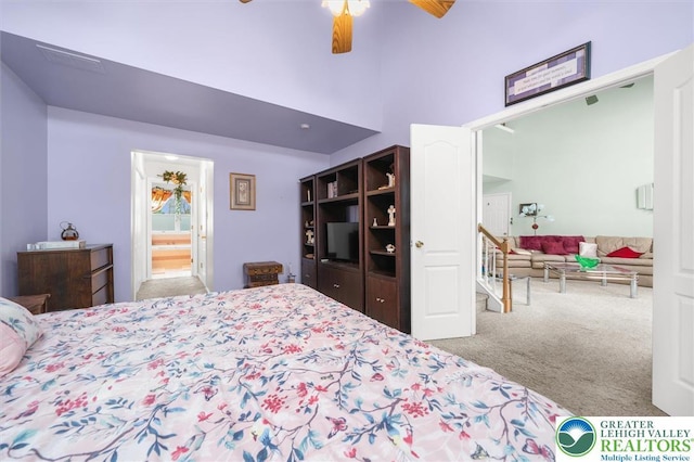 275 Ridings Cir, Macungie Borough, PA 18062 - carpeted bedroom with ceiling fan, a high ceiling, and connected bathroom