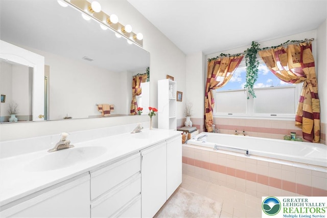 275 Ridings Cir, Macungie Borough, PA 18062 - full bath with a bath, double vanity, and tile patterned flooring
