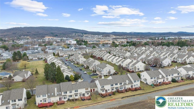 275 Ridings Cir, Macungie Borough, PA 18062 - aerial view of residential area with a mountain backdrop