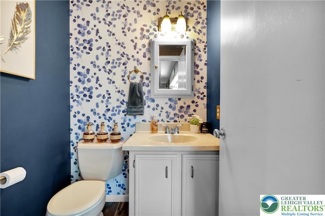 5401 Hale Ave, Hanover Twp, PA 18017 - half bath featuring toilet, vanity, and wallpapered walls
