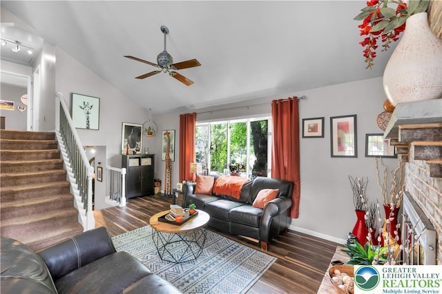 5401 Hale Ave, Hanover Twp, PA 18017 - living room featuring vaulted ceiling, wood finished floors, a fireplace, ceiling fan, and stairs