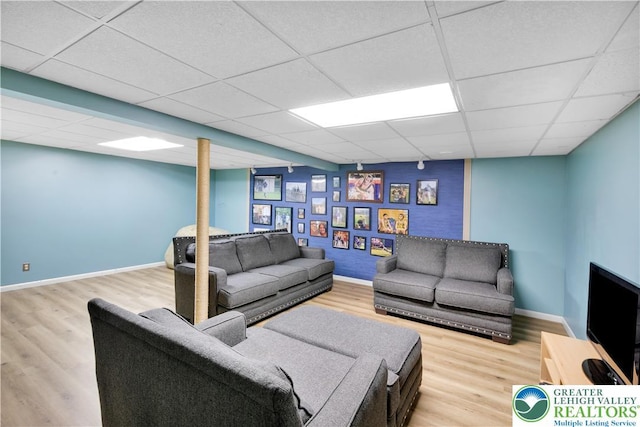 5401 Hale Ave, Hanover Twp, PA 18017 - living room featuring baseboards, a drop ceiling, and wood finished floors
