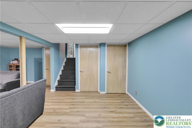 5401 Hale Ave, Hanover Twp, PA 18017 - finished basement featuring light wood-style floors, stairway, a drop ceiling, and baseboards