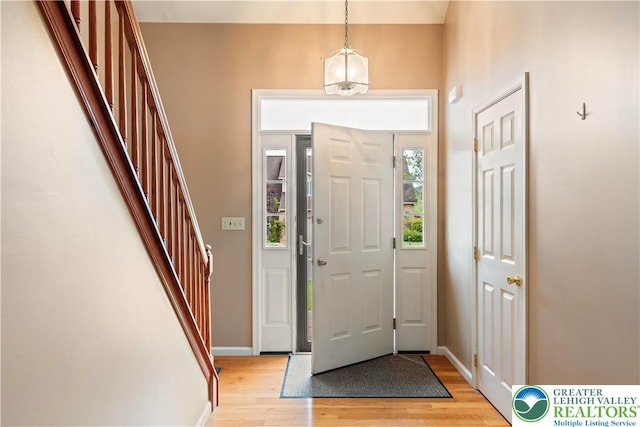2630 Lower Way, Forks Twp, PA 18040 - foyer entrance featuring light wood finished floors, stairway, and baseboards