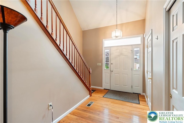 2630 Lower Way, Forks Twp, PA 18040 - foyer with light wood-type flooring, baseboards, stairway, and lofted ceiling