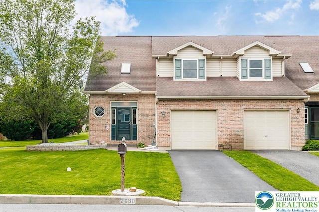2630 Lower Way, Forks Twp, PA 18040 - view of front of house featuring driveway, a front yard, a garage, and brick siding