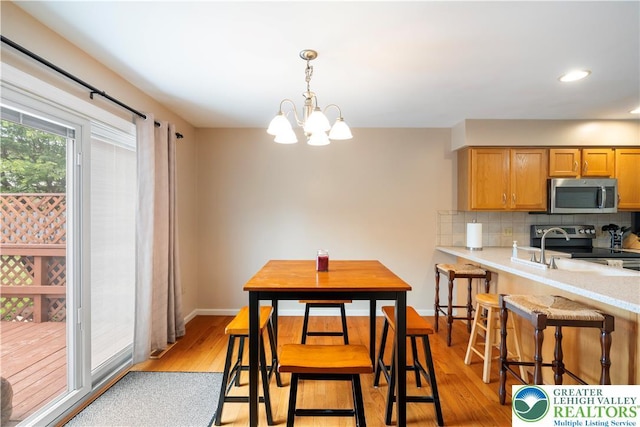 2630 Lower Way, Forks Twp, PA 18040 - dining space featuring a chandelier, light wood-type flooring, baseboards, and recessed lighting