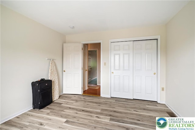 2630 Lower Way, Forks Twp, PA 18040 - unfurnished bedroom featuring light wood-type flooring, a closet, and baseboards