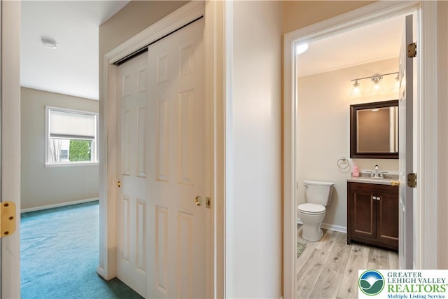 2630 Lower Way, Forks Twp, PA 18040 - bathroom with vanity, baseboards, toilet, and wood finished floors