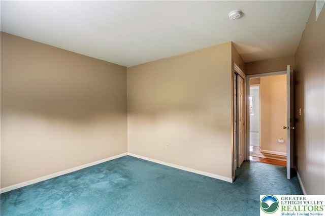 2630 Lower Way, Forks Twp, PA 18040 - spare room featuring a smoke detector, dark colored carpet, and baseboards