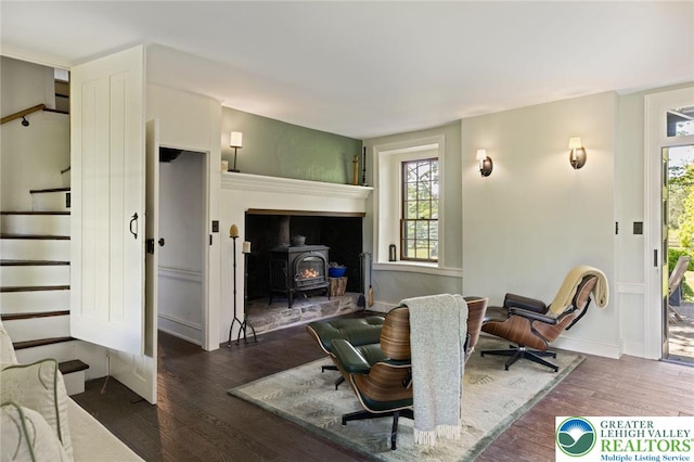 408 Kintner Hill Rd, Nockamixon Twp, PA 18972 - living area with a wood stove, wood finished floors, and stairway