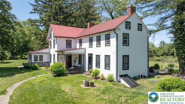 408 Kintner Hill Rd, Nockamixon Twp, PA 18972 - view of front of property with a chimney, stucco siding, metal roof, and a standing seam roof